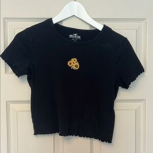 Hollister Black Tee with Yellow Floral Accent